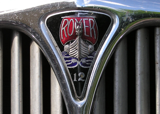 Illustration for article titled Top Ten Car Company Emblems (According to the writers at Prestolite Performance.